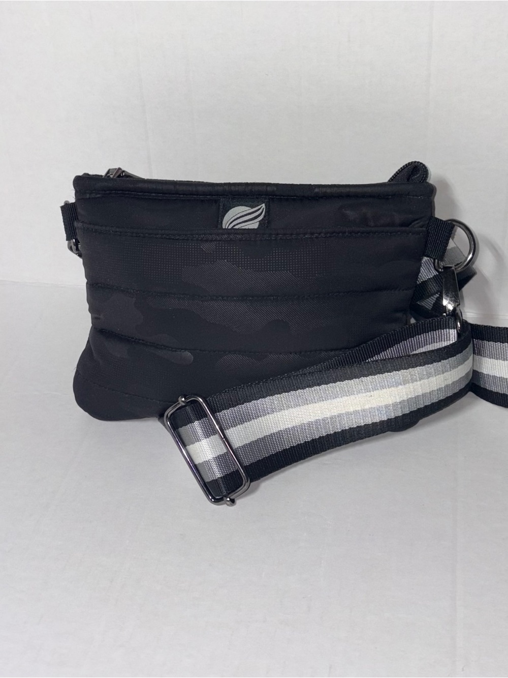 Think Rolyn’s Black Camo Crossbody Bag
